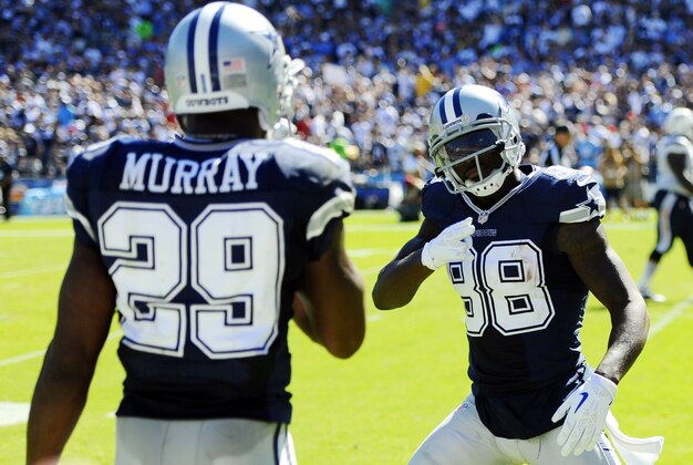 Sep 29, 2013; San Diego, CA, USA; Dallas Cowboys receiver Dez Bryant (88) celebrates with running back DeMarco Murray (29) after a touchdown during the second quarter against the San Diego Chargers at Qualcomm Stadium. Mandatory Credit: Christopher Hanewinckel-USA TODAY Sports