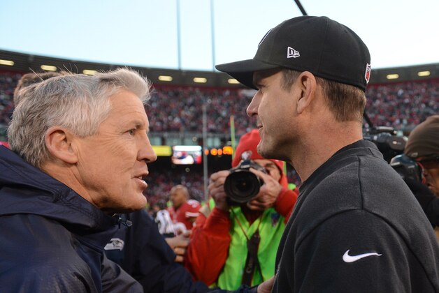 December 8, 2013; San Francisco, CA, USA; Seattle Seahawks head coach Pete Carroll (left) shakes hands with San Francisco 49ers head coach Jim Harbaugh (right) after the game at Candlestick Park. The 49ers defeated the Seahawks 19-17. Mandatory Credit: Kyle Terada-USA TODAY Sports December 8, 2013; San Francisco, CA, USA; Seattle Seahawks head coach Pete Carroll (left) shakes hands with San Francisco 49ers head coach Jim Harbaugh (right) after the game at Candlestick Park. The 49ers defeated the Seahawks 19-17. Mandatory Credit: Kyle Terada-USA TODAY Sports