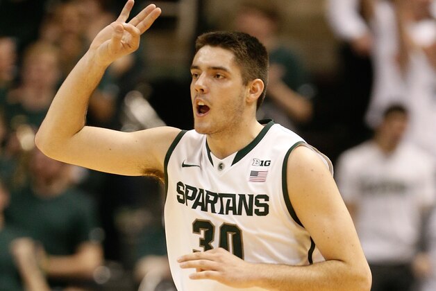 EAST LANSING, MI - JANUARY 11:  Kenny Kaminski #30 of the Michigan State Spartans reacts to making a first half three point basket while playing the Minnesota Golden Gophers at the Jack T. Breslin Student Events Center on January 11, 2014 in East Lansing, Michigan. (Photo by Gregory Shamus/Getty Images)