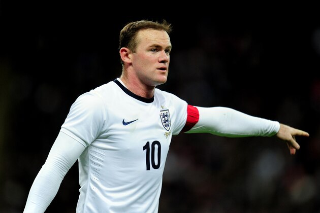 LONDON, ENGLAND - NOVEMBER 19:  Wayne Rooney of England signals during the international friendly match between England and Germany at Wembley Stadium on November 19, 2013 in London, England.  (Photo by Shaun Botterill/Getty Images)