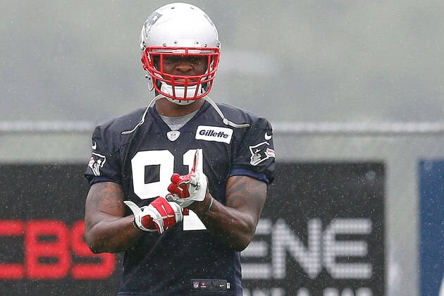 FOXBORO, MA - JULY 26: Jamie Collins #91 walks into position during a drill on the first day of New England Patriots Training Camp at Gillette Stadium on July 26, 2013 in Foxboro, Massachusetts. (Photo by Jim Rogash/Getty Images)
