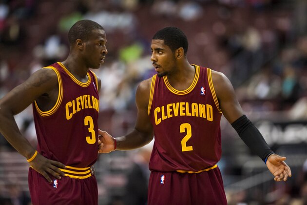 Oct 17, 2012; Philadelphia, PA, USA; Cleveland Cavaliers guard Kyrie Irving (2) talks with guard Dion Waiters (3) during the second quarter against the Philadelphia 76ers at the Wachovia Center. Mandatory Credit: Howard Smith-USA TODAY Sports