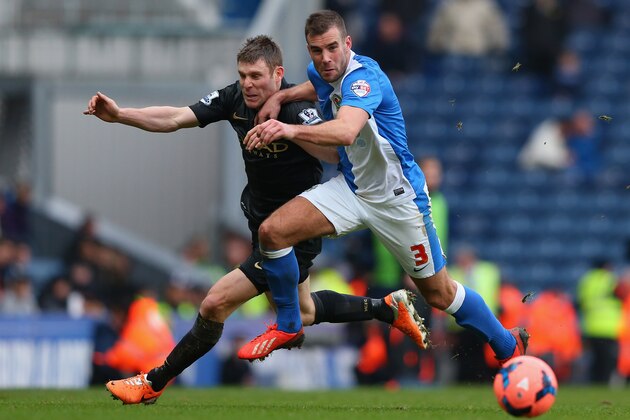 BLACKBURN, ENGLAND - JANUARY 04: Tommy Spurr of Blackburn Rovers holds off a challenge from James Milner of Manchester City during the Budweiser FA Cup third round match between Blackburn Rovers and Manchester City at Ewood Park on January 4, 2014 in Blackburn, England. (Photo by Alex Livesey/Getty Images) BLACKBURN, ENGLAND - JANUARY 04: Tommy Spurr of Blackburn Rovers holds off a challenge from James Milner of Manchester City during the Budweiser FA Cup third round match between Blackburn Rovers and Manchester City at Ewood Park on January 4, 2014 in Blackburn, England. (Photo by Alex Livesey/Getty Images)