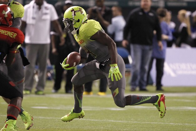 Jan 2, 2014; St. Petersburg, FL, USA; Team Nitro running back Dalvin Cook (4) runs with the ball against the Team Highlight during the second half at Tropicana Field. Mandatory Credit: Kim Klement-USA TODAY Sports