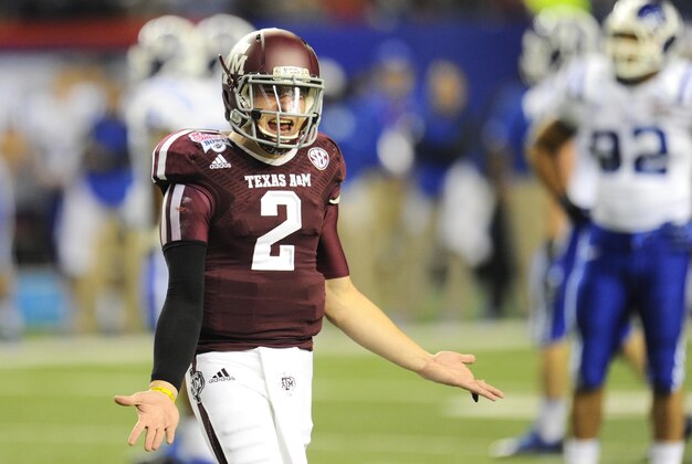 Dec 31, 2013; Atlanta, GA, USA; Texas A&M Aggies quarterback Johnny Manziel (2) reacts to the sideline against the Duke Blue Devils during the second quarter in the 2013 Chick-fil-a Bowl at the Georgia Dome. Mandatory Credit: Dale Zanine-USA TODAY Sports