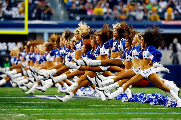 ARLINGTON, TX - DECEMBER 15:  Dallas Cowboys cheerleaders perform prior to a game against the Green Bay Packers at AT&T Stadium on December 15, 2013 in Arlington, Texas.  (Photo by Tom Pennington/Getty Images)