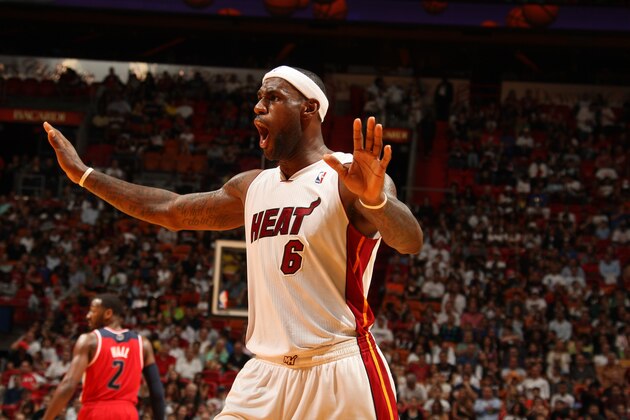 MIAMI, FL - NOVEMBER 3: LeBron James #6 of the Miami Heat reacts against the Washington Wizards on November 3, 2013 at American Airlines Arena in Miami, Florida. NOTE TO USER: User expressly acknowledges and agrees that, by downloading and/or using this photograph, user is consenting to the terms and conditions of the Getty Images License Agreement. Mandatory copyright notice: Copyright NBAE 2013 (Photo by Issac Baldizon/NBAE via Getty Images)