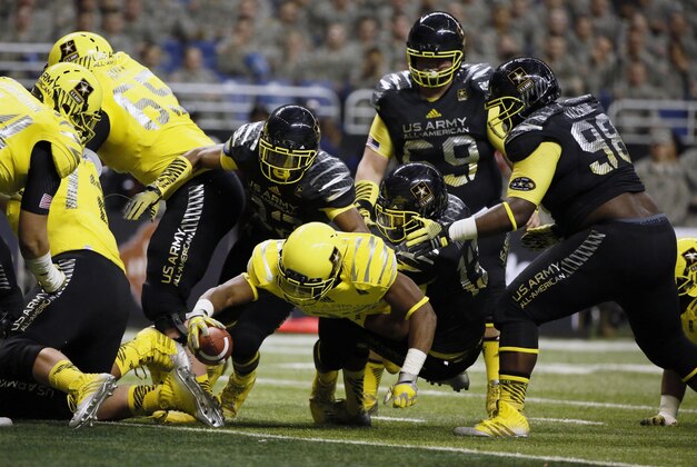 Jan 4, 2014; San Antonio, TX, USA; West running back Royce Freeman (23) dives for a touchdown during U.S. Army All-American Bowl high school football game at the Alamodome. Mandatory Credit: Soobum Im-USA TODAY Sports
