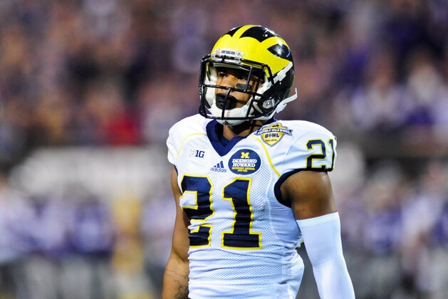 Dec 28, 2013; Tempe, AZ, USA; Michigan Wolverines wide receiver Jeremy Gallon (21) looks on during the first half against the Kansas State Wildcats the Buffalo Wild Wings Bowl at Sun Devil Stadium. Mandatory Credit: Matt Kartozian-USA TODAY Sports