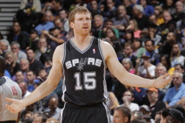 OAKLAND, CA - DECEMBER 19: Matt Bonner #15 of the San Antonio Spurs reacts against the Golden State Warriors on December 19, 2013 at Oracle Arena in Oakland, California. NOTE TO USER: User expressly acknowledges and agrees that, by downloading and or using this photograph, user is consenting to the terms and conditions of Getty Images License Agreement. Mandatory Copyright Notice: Copyright 2013 NBAE (Photo by Rocky Widner/NBAE via Getty Images)