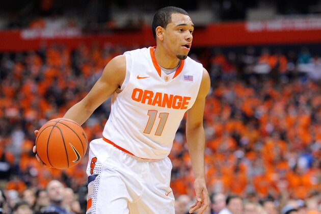 SYRACUSE, NY - DECEMBER 03: Tyler Ennis #11 of the Syracuse Orange scans the court against the Indiana Hoosiers during the first half at the Carrier Dome on December 3, 2013 in Syracuse, New York. Syracuse defeated Indiana 69-52. (Photo by Rich Barnes/Getty Images) SYRACUSE, NY - DECEMBER 03: Tyler Ennis #11 of the Syracuse Orange scans the court against the Indiana Hoosiers during the first half at the Carrier Dome on December 3, 2013 in Syracuse, New York. Syracuse defeated Indiana 69-52. (Photo by Rich Barnes/Getty Images)