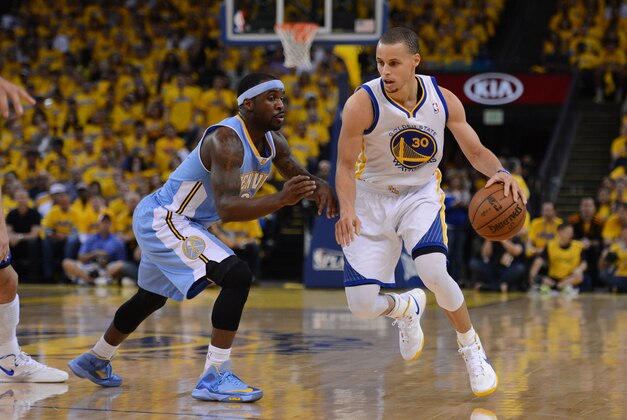 May 2, 2013; Oakland, CA, USA; Golden State Warriors point guard Stephen Curry (30) dribbles against Denver Nuggets point guard Ty Lawson (3, left) during the first quarter of game six of the first round of the 2013 NBA Playoffs at Oracle Arena. Mandatory Credit: Kyle Terada-USA TODAY Sports
