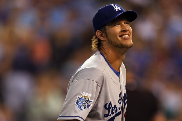 KANSAS CITY, MO - JULY 10:  National League All-Star Clayton Kershaw #22 of the Los Angeles Dodgers  smiles during the 83rd MLB All-Star Game at Kauffman Stadium on July 10, 2012 in Kansas City, Missouri.  (Photo by Jonathan Daniel/Getty Images)