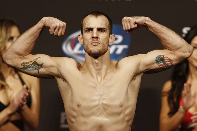 Aug 16, 2013; Boston, MA, USA; Cole Miller poses during the weigh-in for his UFC fight at TD Garden. Mandatory Credit: Winslow Townson-USA TODAY Sports Aug 16, 2013; Boston, MA, USA; Cole Miller poses during the weigh-in for his UFC fight at TD Garden. Mandatory Credit: Winslow Townson-USA TODAY Sports