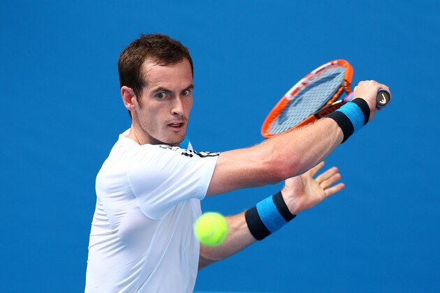 MELBOURNE, AUSTRALIA - JANUARY 14: Andy Murray of Great Britain plays a backhand in his first round match against Go Soeda of Japan during day two of the 2014 Australian Open at Melbourne Park on January 14, 2014 in Melbourne, Australia. (Photo by Cameron Spencer/Getty Images) MELBOURNE, AUSTRALIA - JANUARY 14: Andy Murray of Great Britain plays a backhand in his first round match against Go Soeda of Japan during day two of the 2014 Australian Open at Melbourne Park on January 14, 2014 in Melbourne, Australia. (Photo by Cameron Spencer/Getty Images)