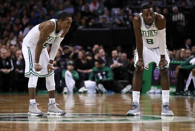 Dec 5, 2012; Boston, Massachusetts, USA; Boston Celtics point guard Rajon Rondo (9) and forward Jeff Green (8) rest at center court during the fourth quarter against the Minnesota Timberwolves at TD Banknorth Garden. The Boston Celtics won 104-94.  Mandatory Credit: Greg M. Cooper-USA TODAY Sports