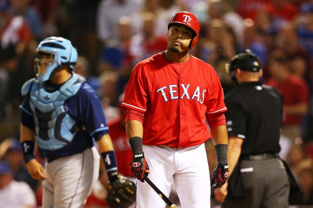 ARLINGTON, TX - SEPTEMBER 30:  Nelson Cruz #17 of the Texas Rangers reacts to a strike in the second inning against the Tampa Bay Rays during the American League Wild Card tiebreaker game at Rangers Ballpark in Arlington on September 30, 2013 in Arlington, Texas.  (Photo by Ronald Martinez/Getty Images)