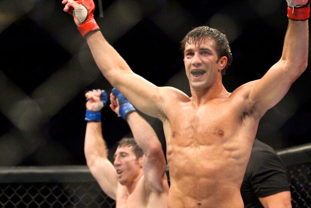 July 14, 2012; Portland, OR, USA; Luke Rockhold celebrates his win over Tim Kennedy in the middleweight championship fight at MMA Strikeforce at the Rose Garden Arena. Mandatory Credit: Scott Olmos-USA TODAY Sports