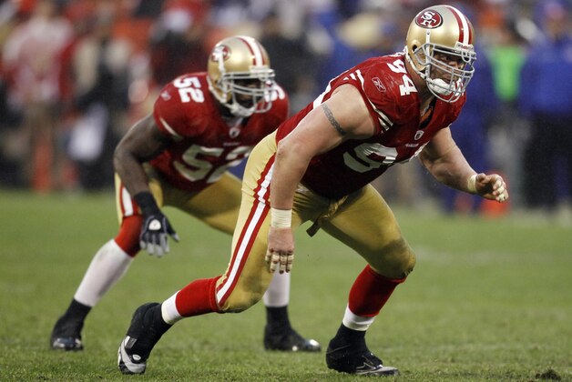 Jan 22, 2012; San Francisco, CA, USA; San Francisco 49ers defensive end Justin Smith (94) and inside linebacker Patrick Willis (52) line up during the 2011 NFC Championship game against the New York Giants at Candlestick Park.  The Giants won 20-17 in overtime. Mandatory Credit: Jason O. Watson-USA TODAY Sports