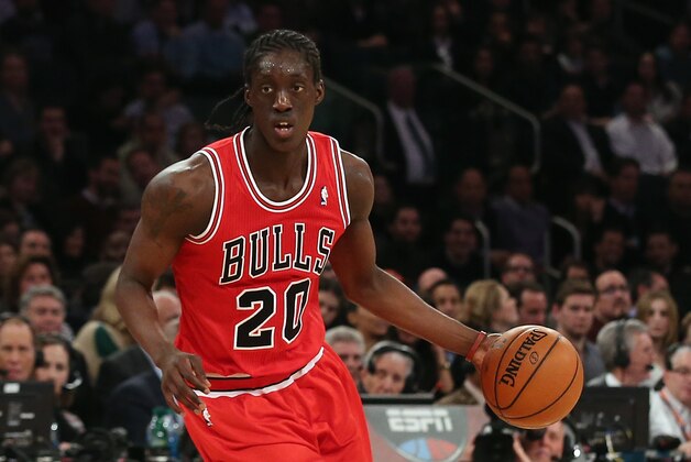 NEW YORK, NY - DECEMBER 11: Tony Snell #20 of the Chicago Bulls dribbles the ball against the New York Knicks at Madison Square Garden on December 11, 2013 in New York City. The Knicks defeated the Bulls 83-78. NOTE TO USER: User expressly acknowledges and agrees that, by downloading and or using this Photograph, user is consenting to the terms and conditions of the Getty Images License Agreement.  (Photo by Bruce Bennett/Getty Images)