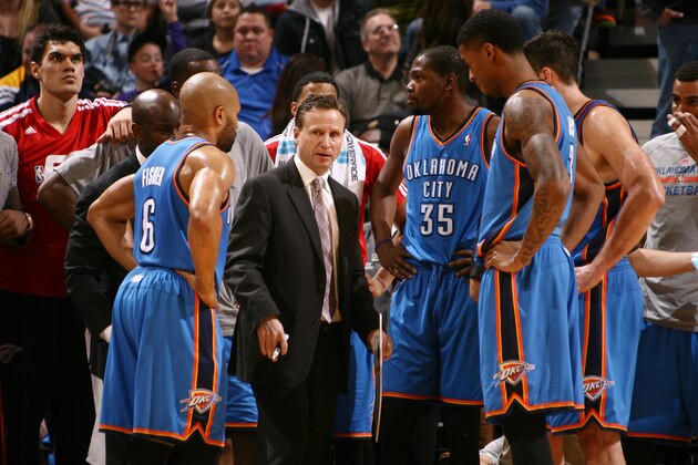 SALT LAKE CITY, UT - JANUARY 07:  Scott Brooks, Head Coach of the Oklahoma City Thunder meets with players during a break in play against the Utah Jazz at EnergySolutions Arena on January 07, 2014 in Salt Lake City, Utah. NOTE TO USER: User expressly acknowledges and agrees that, by downloading and or using this Photograph, User is consenting to the terms and conditions of the Getty Images License Agreement. Mandatory Copyright Notice: Copyright 2013 NBAE (Photo by Melissa Majchrzak/NBAE via Getty Images)