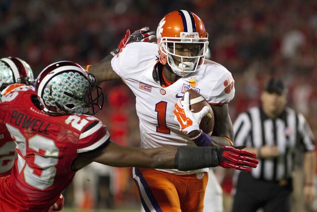Jan 3, 2014; Miami Gardens, FL, USA; Clemson Tigers wide receiver Martavis Bryant (1) runs with the ball against Ohio State Buckeyes defensive back Tyvis Powell (23) during the first half in the 2014 Orange Bowl college football game at Sun Life Stadium. Mandatory Credit: Joshua S. Kelly-USA TODAY Sports