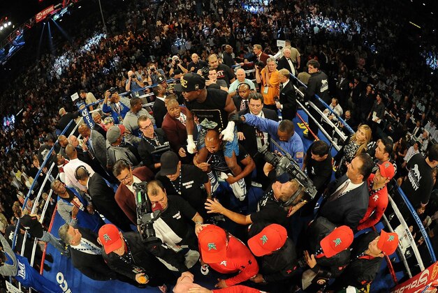 Sep 14, 2013; Las Vegas, NV, USA; Floyd Mayweather Jr celebrates after defeating Canelo Alvarez by a majority decision at their WBC and WBA super welterweight titles fight at MGM Grand Garden Arena. Mandatory Credit: Jayne Kamin-Oncea-USA TODAY Sports