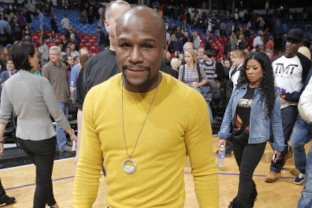 SACRAMENTO, CA - NOVEMBER 5: Boxer Floyd Mayweather Jr. at the Sacramento Kings game against the Atlanta Hawks on November 5, 2013 at Sleep Train Arena in Sacramento, California. NOTE TO USER: User expressly acknowledges and agrees that, by downloading and or using this photograph, user is consenting to the terms and conditions of Getty Images License Agreement. Mandatory Copyright Notice: Copyright 2013 NBAE (Photo by Rocky Widner/NBAE via Getty Images)