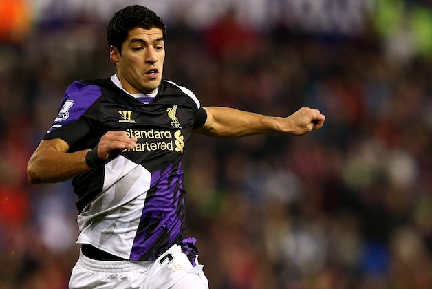 STOKE ON TRENT, ENGLAND - JANUARY 12:  Luis Suarez of Liverpool in action during the Barclays Premier League match between Stoke City and Liverpool at Britannia Stadium on January 12, 2014 in Stoke on Trent, England.  (Photo by Clive Mason/Getty Images)