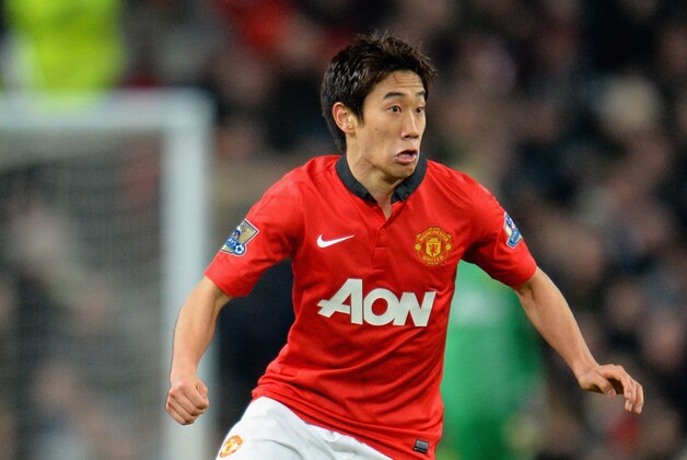 MANCHESTER, ENGLAND - JANUARY 11: Shinji Kagawa of Manchester United in action during the Barclays Premier League match between Manchester United and Swansea City at Old Trafford on January 11, 2014 in Manchester, England. (Photo by Shaun Botterill/Getty Images) MANCHESTER, ENGLAND - JANUARY 11: Shinji Kagawa of Manchester United in action during the Barclays Premier League match between Manchester United and Swansea City at Old Trafford on January 11, 2014 in Manchester, England. (Photo by Shaun Botterill/Getty Images)