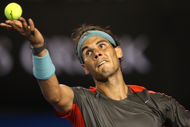 MELBOURNE, AUSTRALIA - JANUARY 16:  Rafael Nadal of Spain serves in his second round match against Thanasi Kokkinakis of Australia during day four of the 2014 Australian Open at Melbourne Park on January 16, 2014 in Melbourne, Australia.  (Photo by Clive Brunskill/Getty Images)