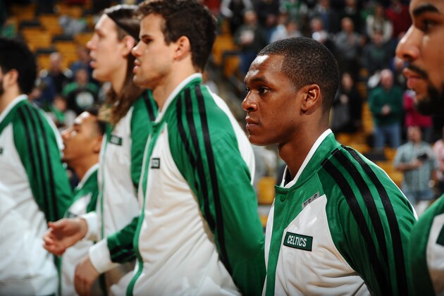 BOSTON, MA - JANUARY 15: Rajon Rondo #9 of the Boston Celtics during the national anthem before the game against the Toronto Raptors on January 15, 2014 at the TD Garden in Boston, Massachusetts. NOTE TO USER: User expressly acknowledges and agrees that, by downloading and or using this photograph, User is consenting to the terms and conditions of the Getty Images License Agreement. Mandatory Copyright Notice: Copyright 2014 NBAE (Photo by Brian Babineau/NBAE via Getty Images) BOSTON, MA - JANUARY 15: Rajon Rondo #9 of the Boston Celtics during the national anthem before the game against the Toronto Raptors on January 15, 2014 at the TD Garden in Boston, Massachusetts. NOTE TO USER: User expressly acknowledges and agrees that, by downloading and or using this photograph, User is consenting to the terms and conditions of the Getty Images License Agreement. Mandatory Copyright Notice: Copyright 2014 NBAE (Photo by Brian Babineau/NBAE via Getty Images)