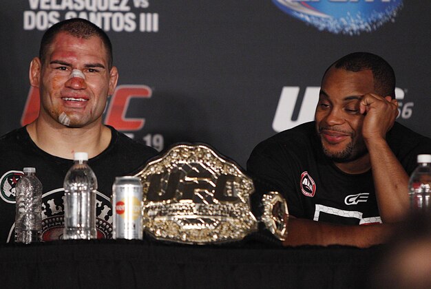 Oct 19, 2013; Houston, TX, USA; Cain Velasquez (left) and Daniel Cormier during the press conference following UFC 166 at Toyota Center. Mandatory Credit: Andrew Richardson-USA TODAY Sports Oct 19, 2013; Houston, TX, USA; Cain Velasquez (left) and Daniel Cormier during the press conference following UFC 166 at Toyota Center. Mandatory Credit: Andrew Richardson-USA TODAY Sports