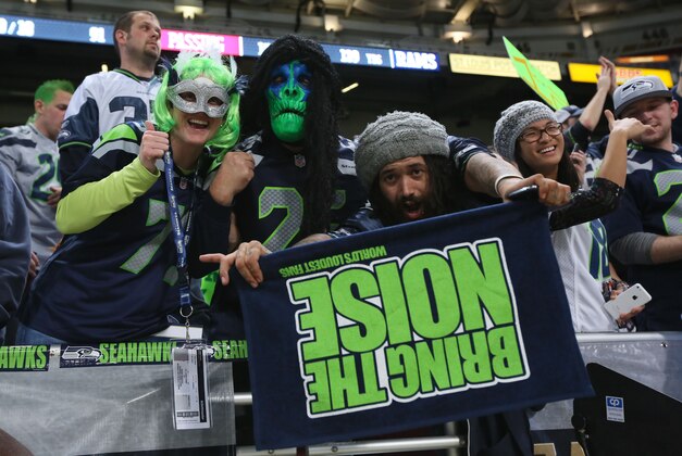 Oct 28, 2013; St. Louis, MO, USA; Seattle Seahawks fans celebrate after the game against the St. Louis Rams at Edward Jones Dome. Seahawks defeated the Rams 14-9. Mandatory Credit: Nelson Chenault-USA TODAY Sports