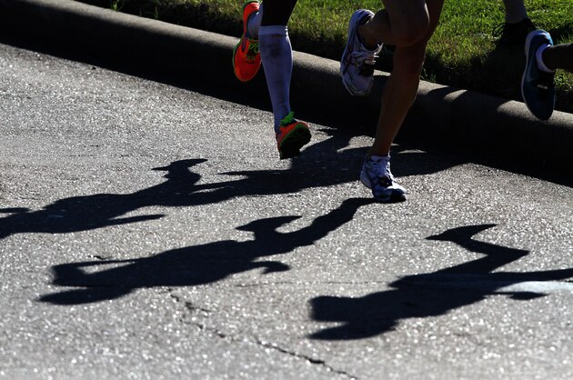 HOUSTON, TX - JANUARY 14: Runners shadows are seen as they compete in the U.S. Marathon Olympic Trials January 14, 2012 in Houston, Texas. (Photo by Thomas B. Shea/Getty Images)