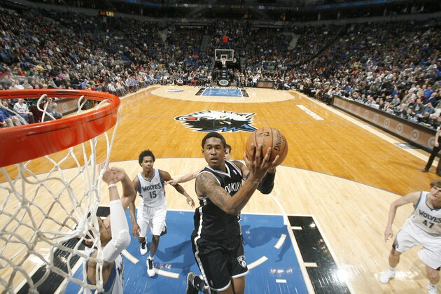 MINNEAPOLIS, MN - JANUARY 23:  MarShon Brooks #9 of the Brooklyn Nets goes to the basket during the game between the Minnesota Timberwolves and the Brooklyn Nets on January 23, 2013 at Target Center in Minneapolis, Minnesota. NOTE TO USER: User expressly acknowledges and agrees that, by downloading and or using this Photograph, user is consenting to the terms and conditions of the Getty Images License Agreement. Mandatory Copyright Notice: Copyright 2013 NBAE (Photo by David Sherman/NBAE via Getty Images)