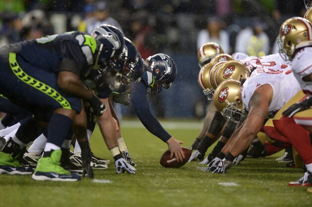 Dec 23, 2012; Seattle, WA, USA; General view of the line of scrimmage as Seattle Seahawks long snapper Clint Gresham snaps the ball against the San Francisco 49ers at CenturyLink Field. Mandatory Credit: Kirby Lee/Image of Sport-USA TODAY Sports