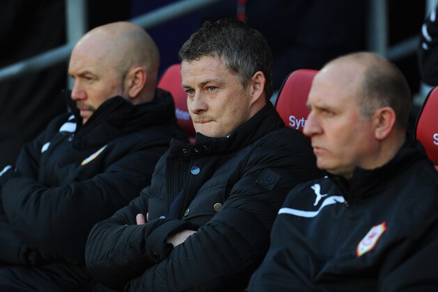 CARDIFF, WALES - JANUARY 11: New Cardiff manager Ole Gunnar Solskjaer (c) looks on before the Barclays Premier League match between Cardiff City and West Ham United at Cardiff City Stadium on January 11, 2014 in Cardiff, Wales. (Photo by Stu Forster/Getty Images) CARDIFF, WALES - JANUARY 11: New Cardiff manager Ole Gunnar Solskjaer (c) looks on before the Barclays Premier League match between Cardiff City and West Ham United at Cardiff City Stadium on January 11, 2014 in Cardiff, Wales. (Photo by Stu Forster/Getty Images)