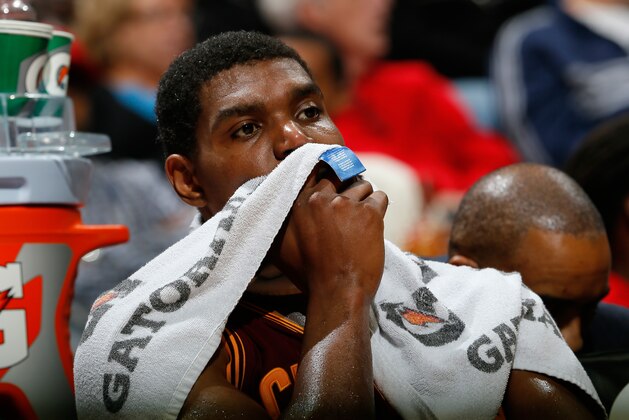 ATLANTA, GA - DECEMBER 06:  Andrew Bynum #21 of the Cleveland Cavaliers reacts in the final minutes of their 108-89 loss to the Atlanta Hawks at Philips Arena on December 6, 2013 in Atlanta, Georgia.  NOTE TO USER: User expressly acknowledges and agrees that, by downloading and or using this photograph, User is consenting to the terms and conditions of the Getty Images License Agreement.  (Photo by Kevin C. Cox/Getty Images)