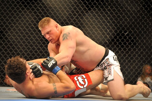 LAS VEGAS - JULY 11: Brock Lesnar holds down Frank Mir during their heavyweight title bout during UFC 100 on July 11, 2009 in Las Vegas, Nevada. Lesnar defeated Mir by a second round knockout. (Photo by Jon Kopaloff/Getty Images) LAS VEGAS - JULY 11: Brock Lesnar holds down Frank Mir during their heavyweight title bout during UFC 100 on July 11, 2009 in Las Vegas, Nevada. Lesnar defeated Mir by a second round knockout. (Photo by Jon Kopaloff/Getty Images)