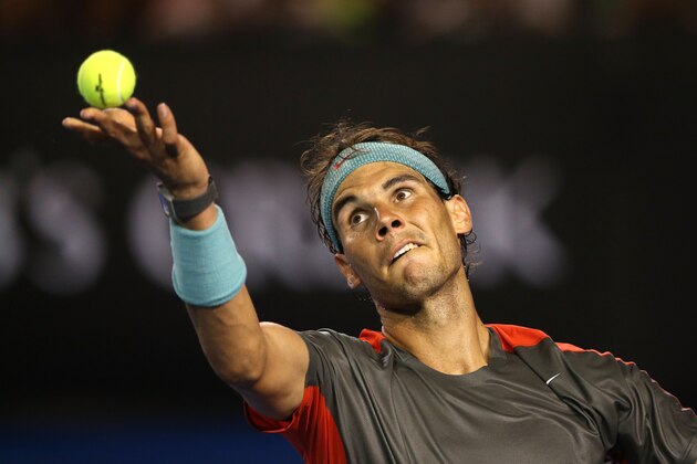 MELBOURNE, AUSTRALIA - JANUARY 16:  Rafael Nadal of Spain serves in his second round match against Thanasi Kokkinakis of Australia during day four of the 2014 Australian Open at Melbourne Park on January 16, 2014 in Melbourne, Australia.  (Photo by Clive Brunskill/Getty Images)
