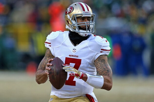 GREEN BAY, WI - JANUARY 05:  Colin Kaepernick #7 of the San Francisco 49ers rolls out to look for a receiver against the Green Bay Packers during an NFC Wild Card Playoff game at Lambeau Field on January 5, 2014 in Green Bay, Wisconsin. The 49ers defeated the Packers 23-20.  (Photo by Jonathan Daniel/Getty Images)