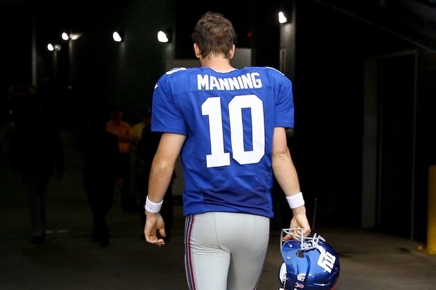 EAST RUTHERFORD, NJ - OCTOBER 06:  Eli Manning #10 of the New York Giants walks off the field after the game against the Philadelphia Eagles at MetLife Stadium on October 6, 2013 in East Rutherford, New Jersey.The Philadelphia Eagles defeated the New York Giants 36-21.  (Photo by Elsa/Getty Images)