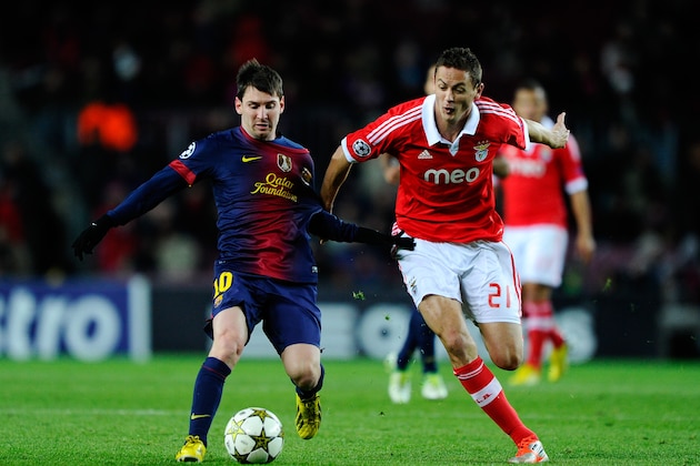 BARCELONA, SPAIN - DECEMBER 05:  Lionel Messi of FC Barcelona duels for the ball with Nemanja Matic of SL Benfica during the UEFA Champions League Group G match between FC Barcelona and SL Benfica at Nou Camp on December 5, 2012 in Barcelona, Spain.  (Photo by David Ramos/Getty Images)