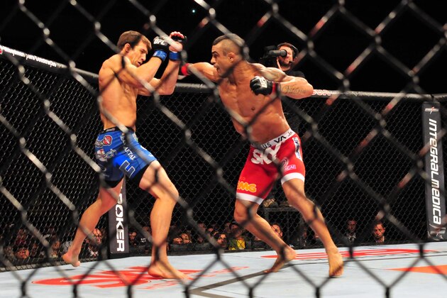 May 18, 2013; Jaragua do Sul, BRAZIL; Luke Rockhold (blue shorts) fights against Vitor Belfort (red shorts) during UFC on FX 8 at ARena Jaragua. Mandatory Credit: Jason da Silva-USA TODAY Sports