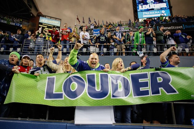 SEATTLE, WA - SEPTEMBER 15:  Fans cheer during the game between the Seattle Seahawks and the San Francisco 49ers at CenturyLink Field on September 15, 2013 in Seattle, Washington.  (Photo by Otto Greule Jr/Getty Images)