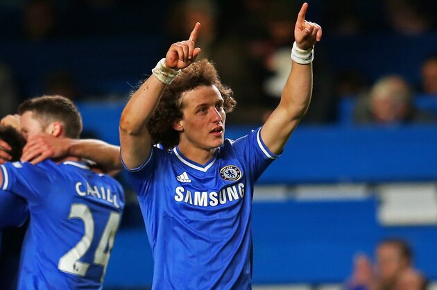 LONDON, ENGLAND - DECEMBER 29:  David Luiz of Chelsea salutes the home fans following their team's victory during the Barclays Premier League match between Chelsea and Liverpool at Stamford Bridge on December 29, 2013 in London, England.  (Photo by Julian Finney/Getty Images)