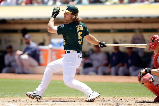 OAKLAND, CA - JULY 14:  John Jaso #5 of the Oakland Athletics bats against the Boston Red Sox at O.co Coliseum on July 14, 2013 in Oakland, California.  (Photo by Ezra Shaw/Getty Images)
