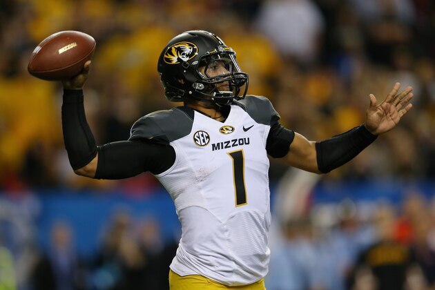 ATLANTA, GA - DECEMBER 07:  Quarterback James Franklin #1 of the Missouri Tigers passes against the Auburn Tigers in the second half during the SEC Championship Game at Georgia Dome on December 7, 2013 in Atlanta, Georgia.  (Photo by Mike Ehrmann/Getty Images)