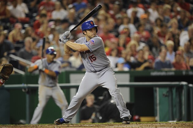 New York Mets' Travis d'Arnaud (15) bats during the seventh inning of a baseball game against the Washington Nationals, Saturday, Aug. 31, 2013, in Washington. The Mets won 11-3. (AP Photo/Nick Wass)
